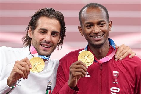 Olympic High Jumpers Share the Gold Medal | Photos | POPSUGAR Fitness Photo 9