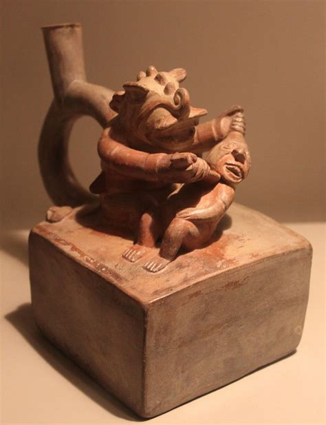 Moche sculptural stirrup spout bottle: Decapitator God | South american art, Ancient art, Sculpture