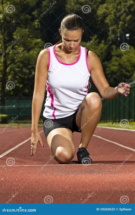 Young Woman in Sprinting Position Stock Photo - Image of young, jogging: 20260622