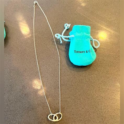 Tiffany & Co. | Jewelry | Tiffany And Co Silver Friendship Rings Necklace In Silver | Poshmark