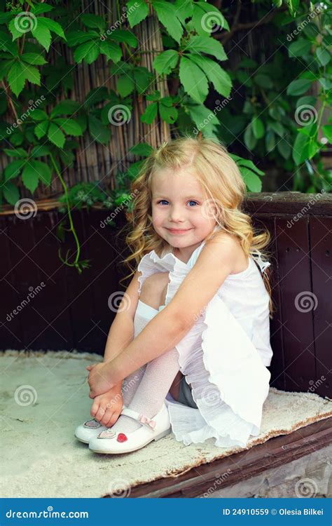 Little Baby Girl Sitting on Bench in Garden Stock Image - Image of outdoor, child: 24910559