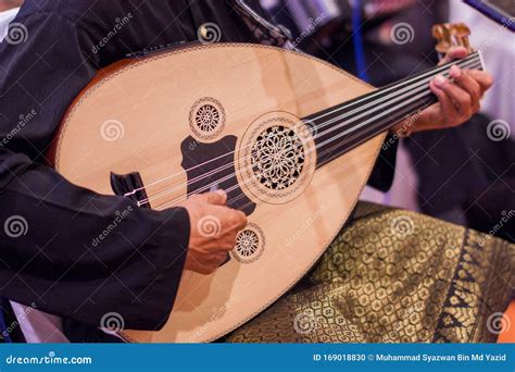 A Man Playing a Gambus on a Wedding Event. Stock Photo - Image of gambus, entertainment: 169018830