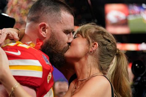 Taylor Swift and Travis Kelce kiss after Chiefs' Super Bowl 2024 win