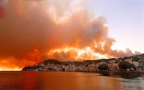 Thousands flee fires in Greece, Turkey; some rescued by sea ...