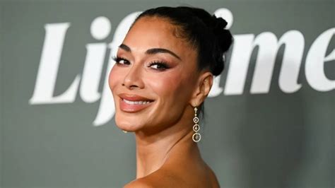Nicole Scherzinger Takes a Dip in the Sea in Stringy Bikini