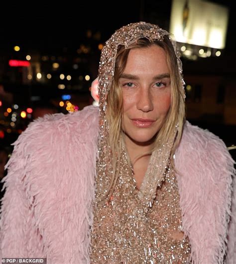 Kesha goes bra-less beneath beaded nude gown at pre-Golden Globes bash