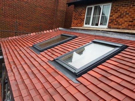 Velux Roof Windows and Flat Roof Windows - DMR Roofing Centre Ltd