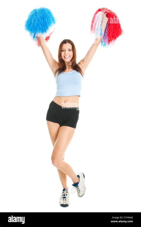 Smiling cheerleader girl posing with pom poms. Isolated on white Stock