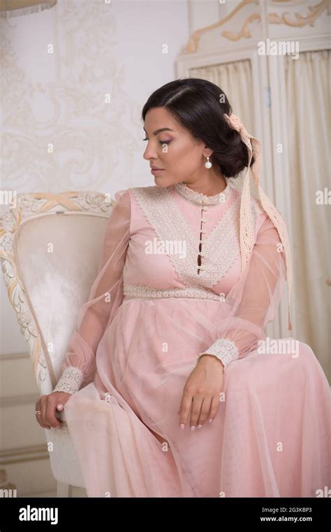 Royal lady in vintage interior Stock Photo - Alamy