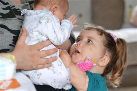 Youngster Harmonie-Rose who lost arms and legs helps raise awareness of ...