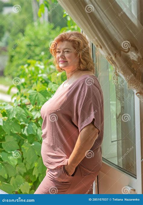 Plump Lady in Fashionable Clothes, Woman of 50-55 Years Old Stock Image