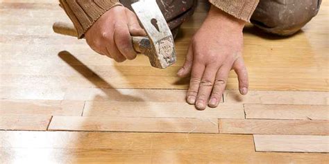 how to fix a buckled hardwood floor
