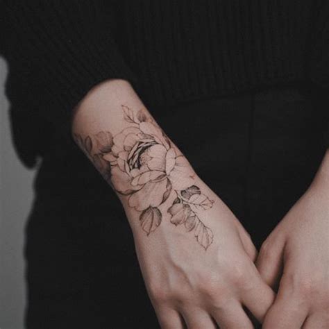 Floral Wrist Tattoo | Wrist tattoos for women, Flower wrist tattoos ...