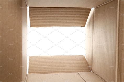 Concept of delivery, surprise, gift, open cardboard box inside ...