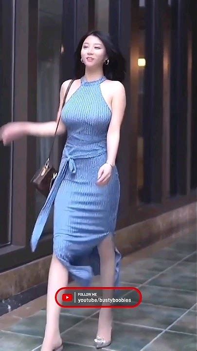 busty chinese girl walks  smiles  camera shorts viral youtube