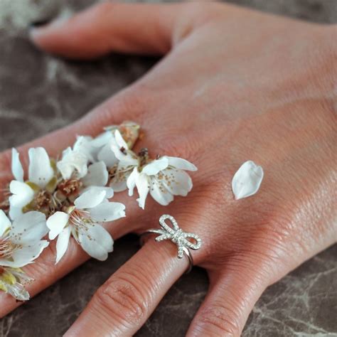 delicate designed bow ring