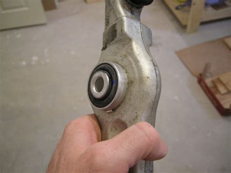 changing  control arm bushing