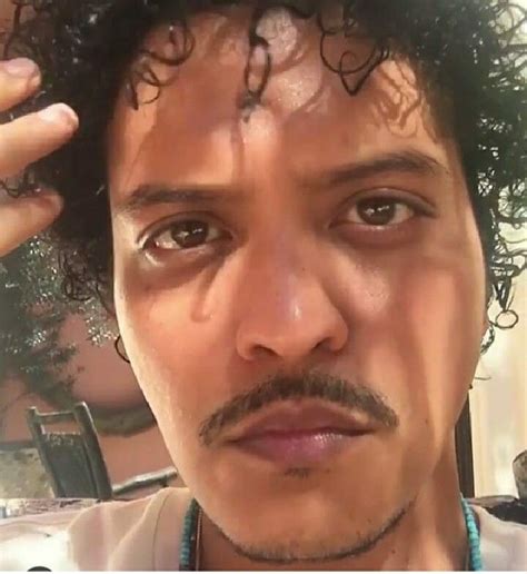 Close Up of Bruno Mars with Curly Hair and Moustache