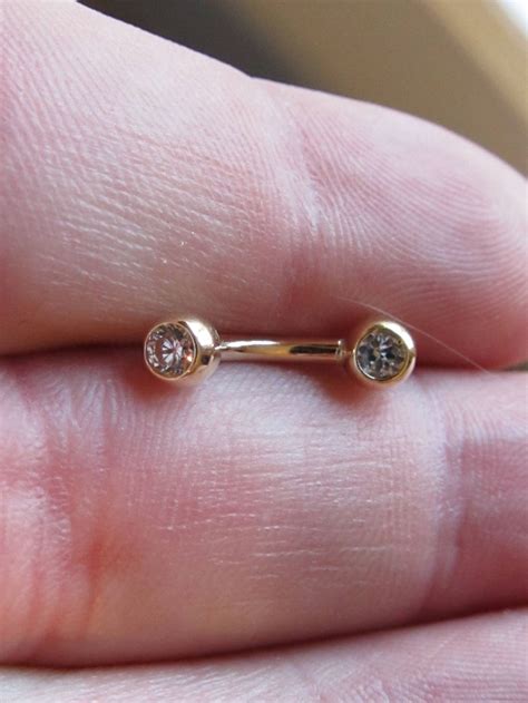 kt gold genitalclithoodchristina piercing double clear czs curved