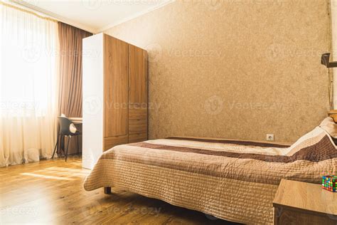 Bright empty cozy large kids sleeping room with computer table isolated