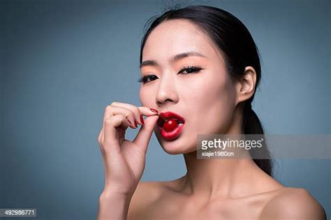 Cherry Red Nail Polish Photos and Premium High Res Pictures - Getty Images