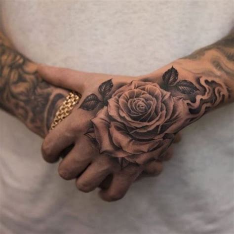 Tatuagem De Flor Na Mao Masculina