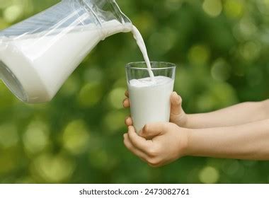 Holding Jug Milk Photos and Images | Shutterstock