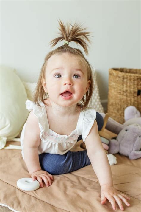 Toddler Child Plays with Developmental Toys. Little Girl. Basket for ...