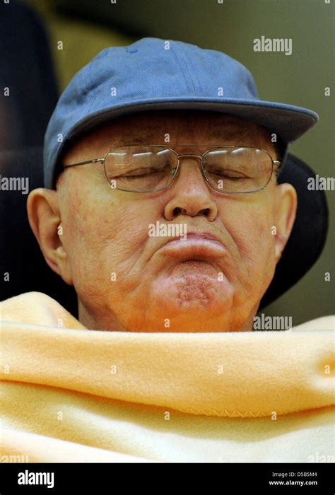 The presumable former concentration camp guard, John Demyanyuk waits ...