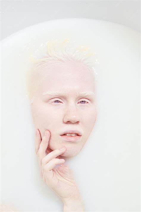 Premium Photo | Serene albino woman with no makeup on her face lying in