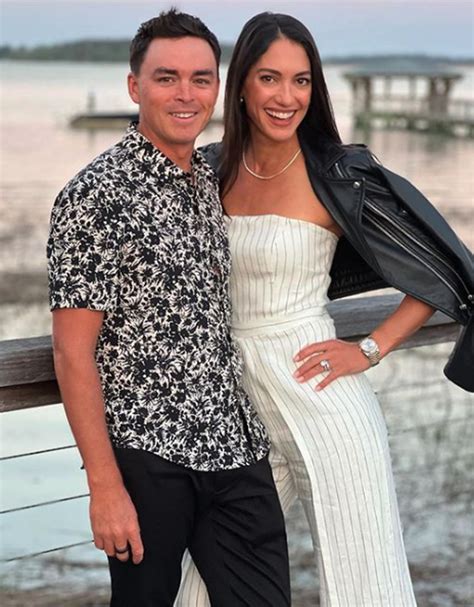 Rickie Fowler embraces wife Allison Stokke after Rocket Mortgage