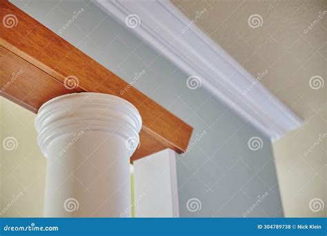 Modern Home Interior with Classical Column and Wooden Beam Stock Photo ...