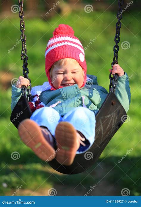swinging child stock image image  garden childhood