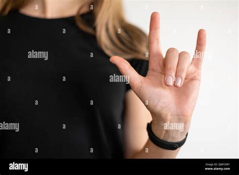 Portrait interpreter teaching sign language Stock Photo - Alamy
