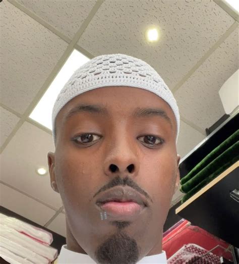 man wearing  white hat  bow tie