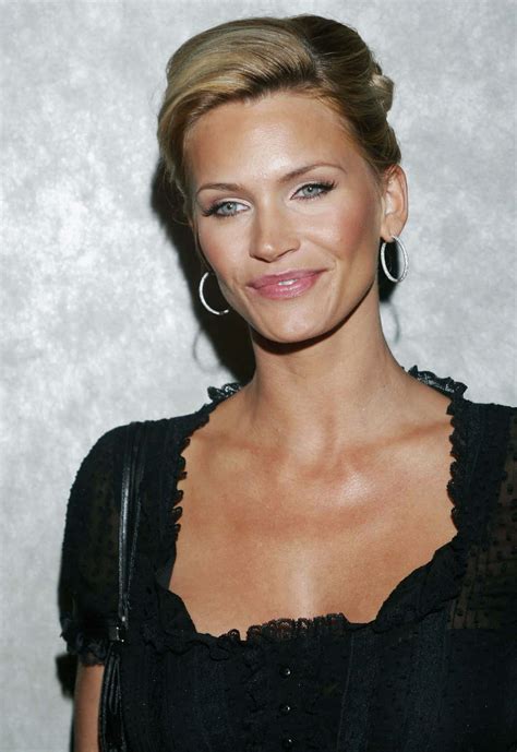 Download Natasha Henstridge stunning in a black dress Wallpaper