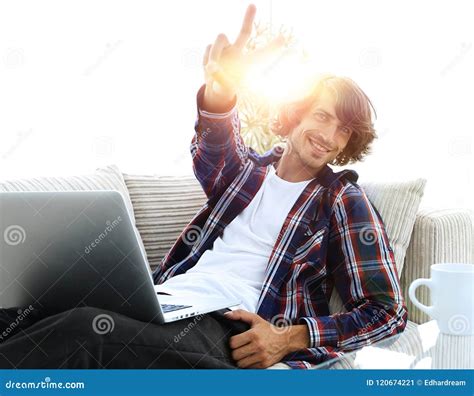 Happy Guy with a Laptop Showing a Winning Gesture. Concept of Success ...