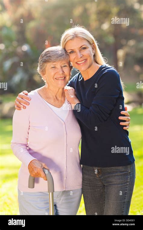 Beautiful mature woman outdoors hi-res stock photography and images - Alamy