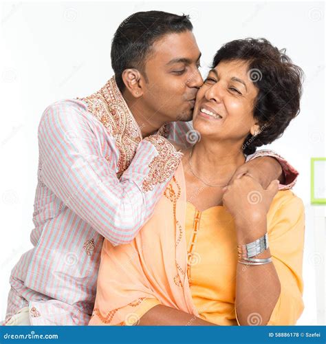 Indian Family, Son Kissing Mother Stock Photo - Image of asian, male