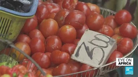 dr congo locals feel  crunch  currency falls  prices rise