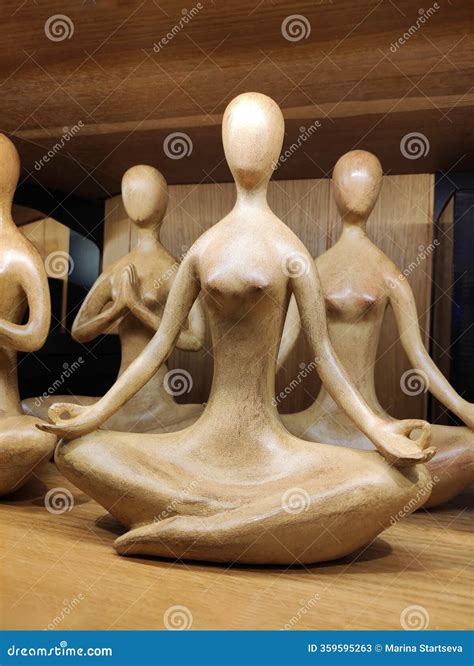 Decorative Wooden Statuette of a Naked Woman Sitting in Lotus Position