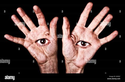 Creepy eyes on the palms of hands Stock Photo: 73016783 - Alamy