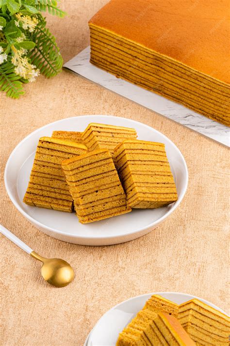 Premium Photo | Spekkoek kue lapis legit or spekuk in indonesian is a
