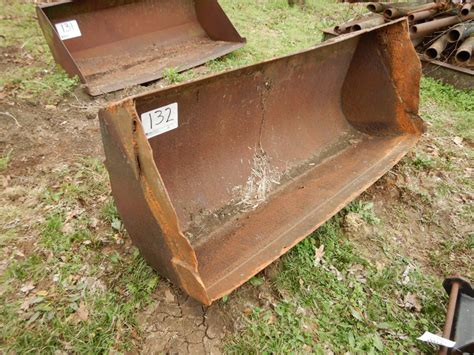 72'' FRONT LOADER BUCKET - J.M. Wood Auction Company, Inc.