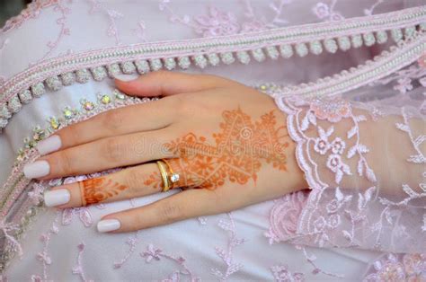 Henna Tattoo on Bride`s Hand.Moroccan Wedding Preparation Henna Party