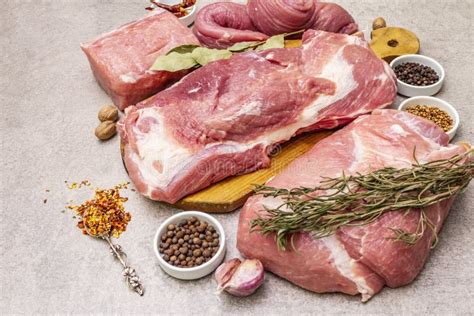 Assorted Various Pork Cuts. Raw Meat with Spices. Tenderloin, Shoulder ...