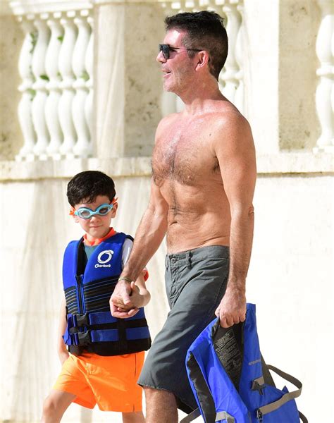 Is Simon Cowell's Son's Disability More Than Meets The Eye? Discover The Facts. Image 2