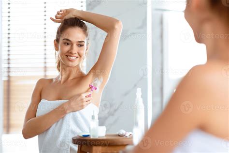 Hair Removal. Happy Lady Making Depilation Underarms Shaving Armpits
