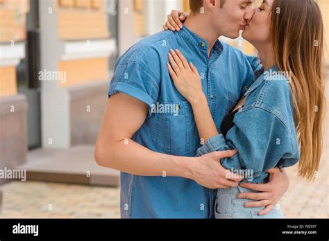 Sweet kiss from an adorable couple Stock Photo - Alamy