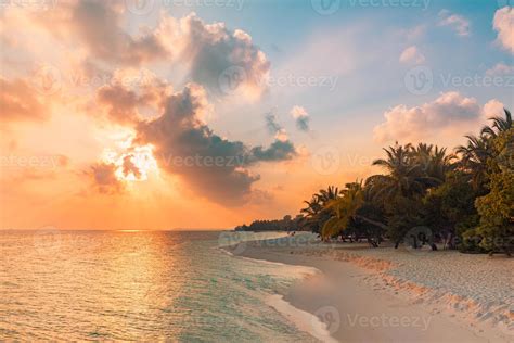Fantastic sunset beach scene. Colorful sky and clouds view with calm